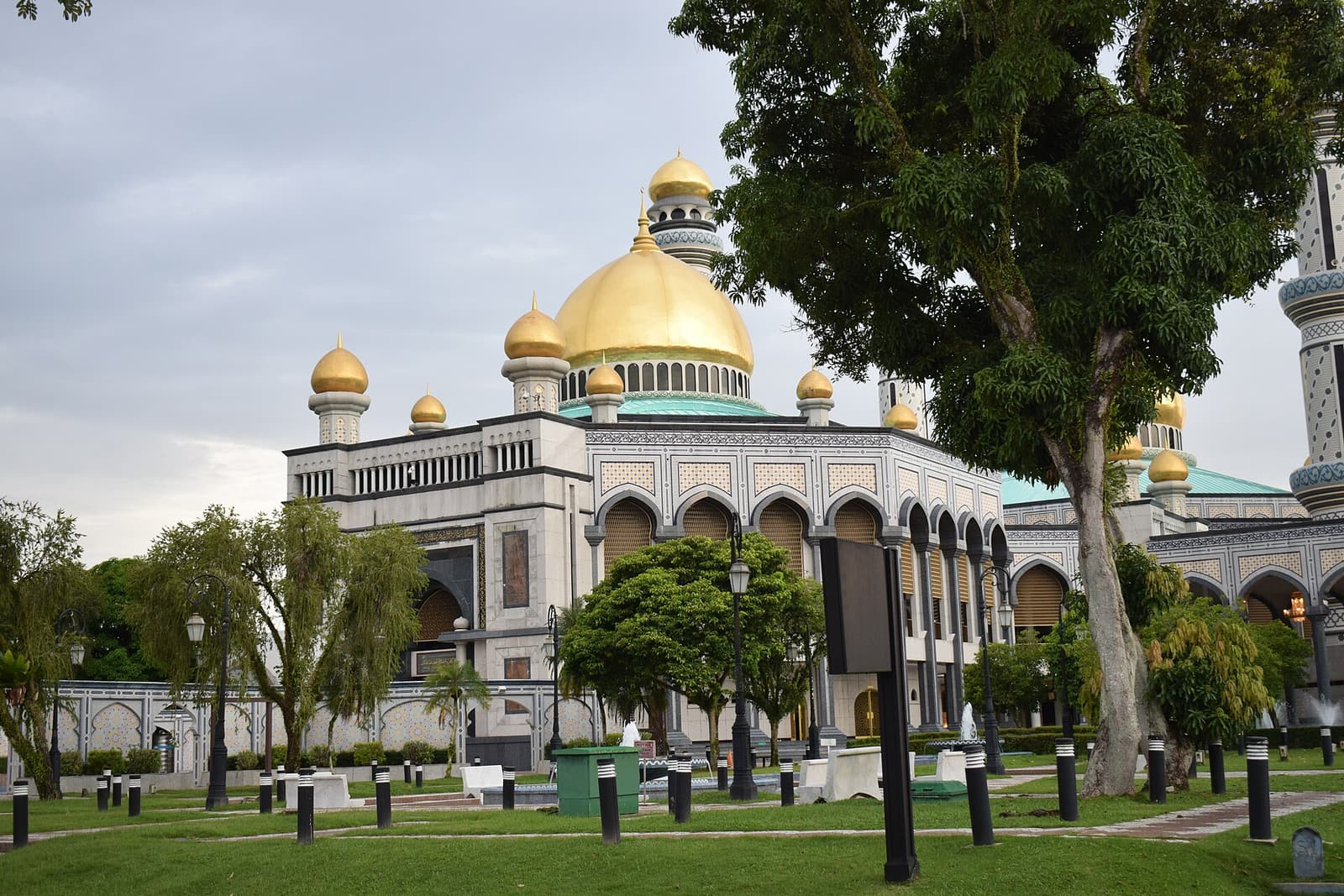 The golden domes of the Jame’ Asr Hassanil Bolkiah Mosque above its gardens